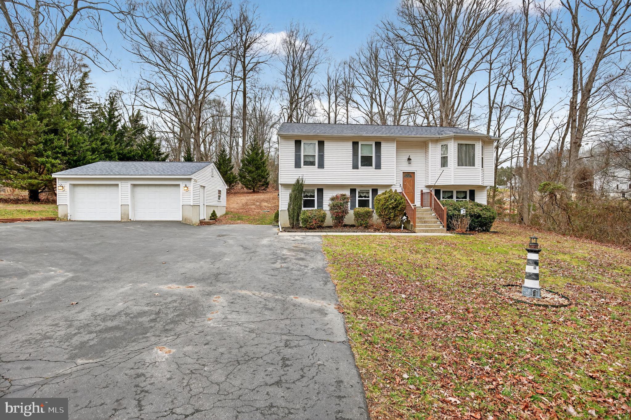 3240 Richfield Road Huntingtown, MD 20639 - Photo 1 of 33 a view of house with outdoor space and sitting area