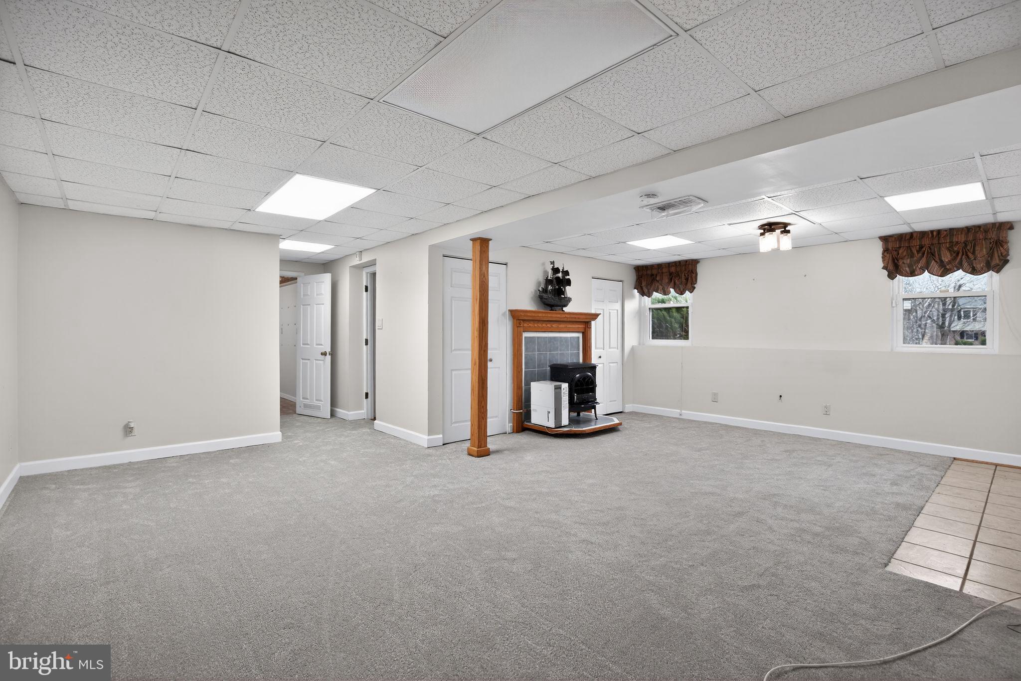 3240 Richfield Road Huntingtown, MD 20639 - Photo 18 of 33 a view of empty room with fireplace