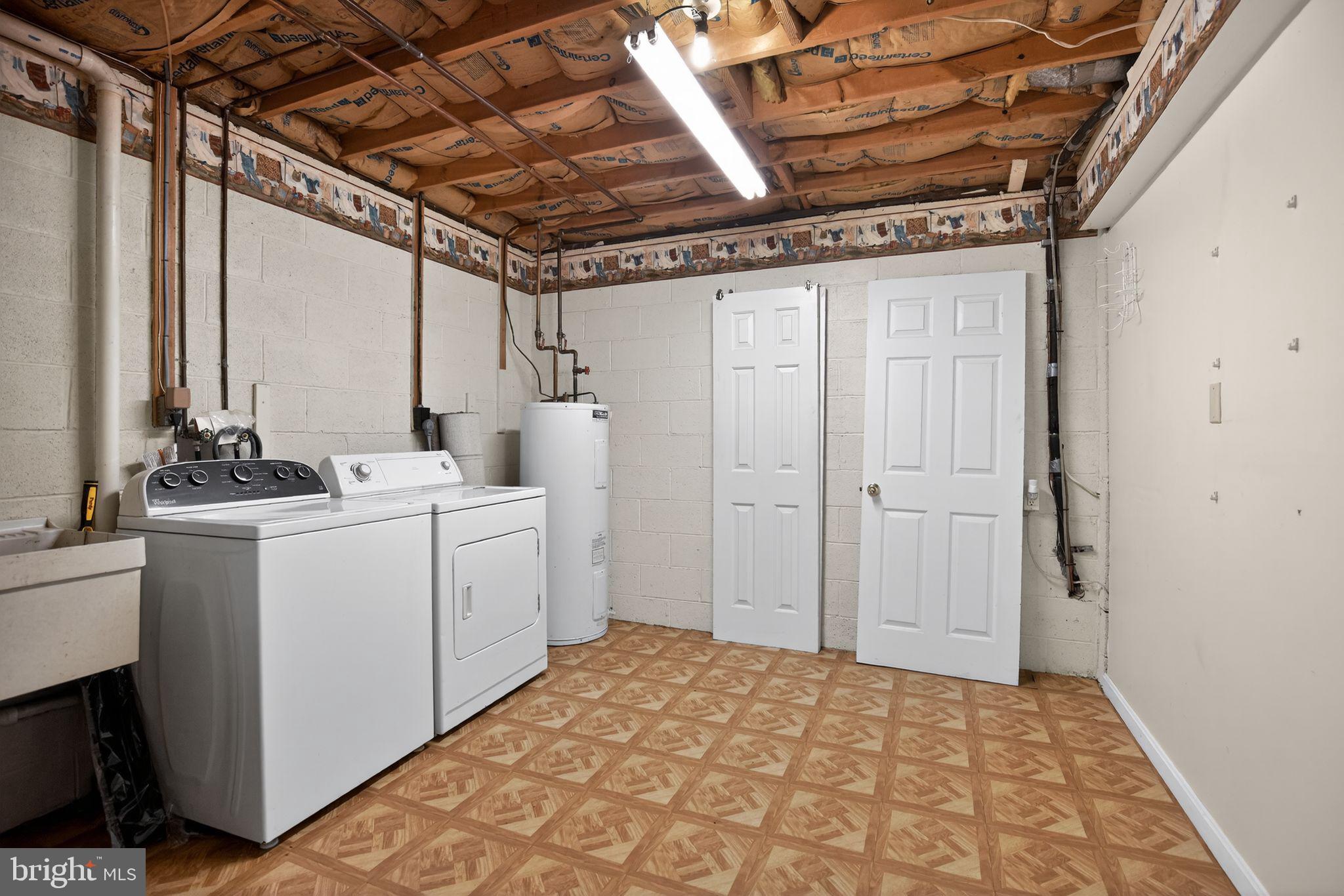3240 Richfield Road Huntingtown, MD 20639 - Photo 21 of 33 a utility room with dryer and washer