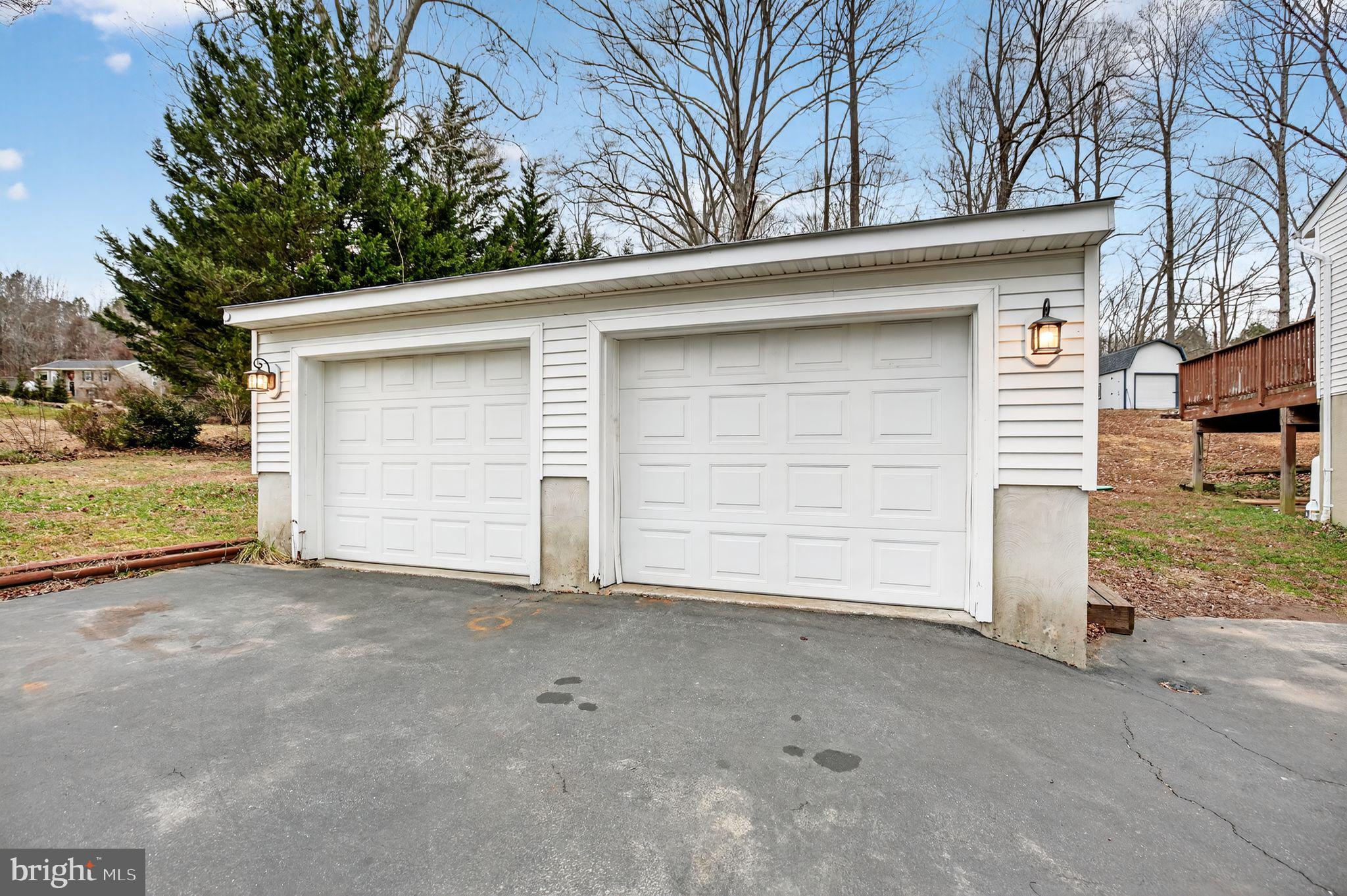 3240 Richfield Road Huntingtown, MD 20639 - Photo 23 of 33 a view of a house with a garage