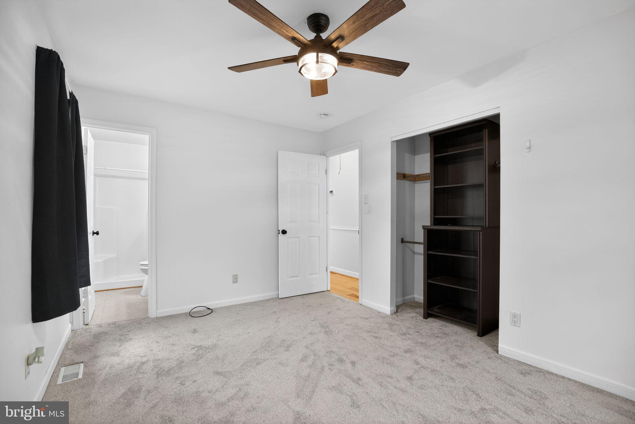 3240 Richfield Road Huntingtown, MD 20639 - Photo 9 of 33 wooden floor in an empty room