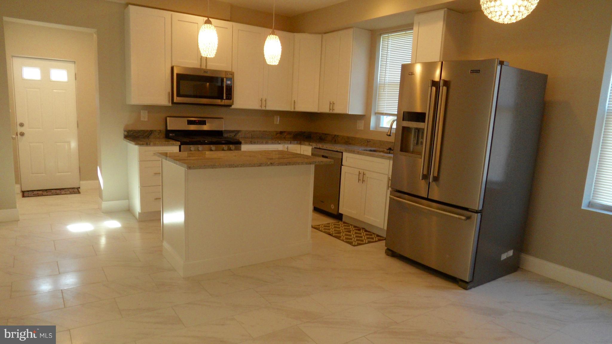 7401 Windsor Mill Road Baltimore, MD 21244 - Photo 5 of 40 New Gourmet Kitchen w/42" White Shaker Cabinets