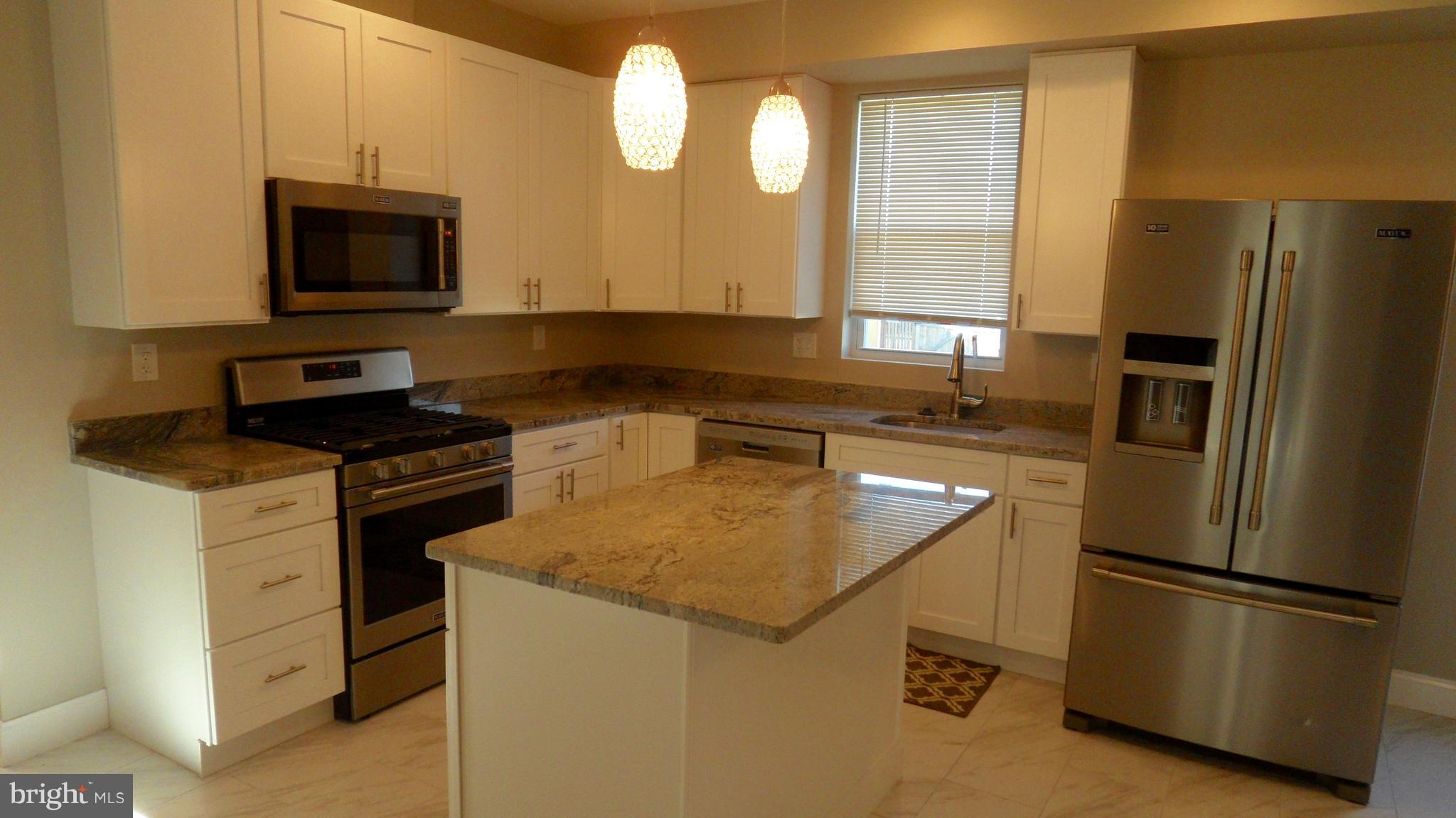 7401 Windsor Mill Road Baltimore, MD 21244 - Photo 6 of 40 Center Island/Breakfast Bar w/Pendant Lights