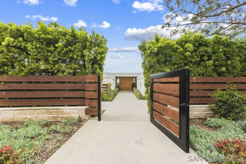 9648 Blackgold Road La Jolla, CA 92037 - Photo 3 of 25 a view of house entrance and garden