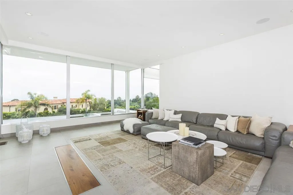 9648 Blackgold Road La Jolla, CA 92037 - Photo 4 of 25 a living room with furniture and a large window