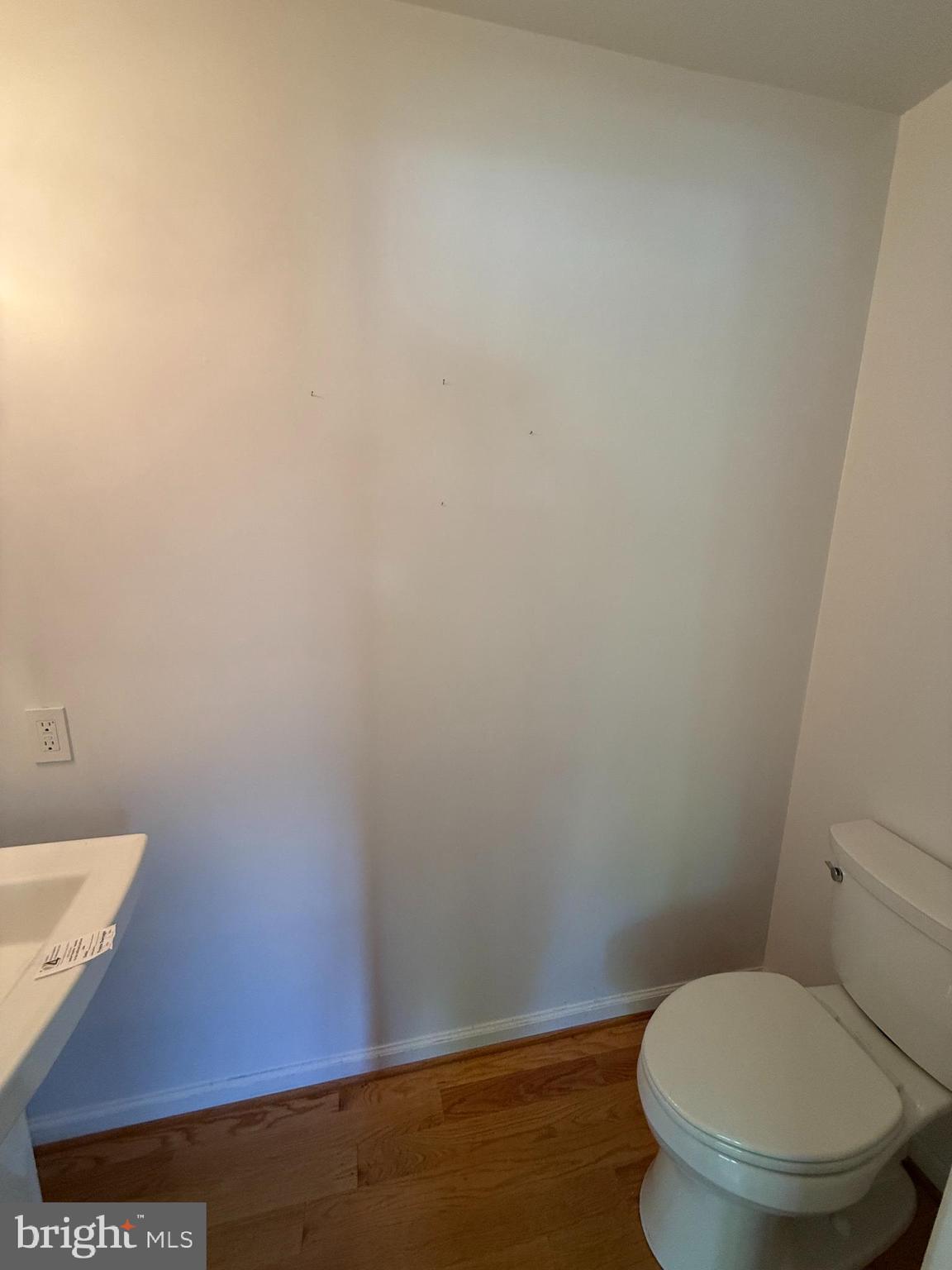2133 Freda Drive Vienna, VA 22181 - Photo 11 of 35 a white toilet sitting next to a white wall