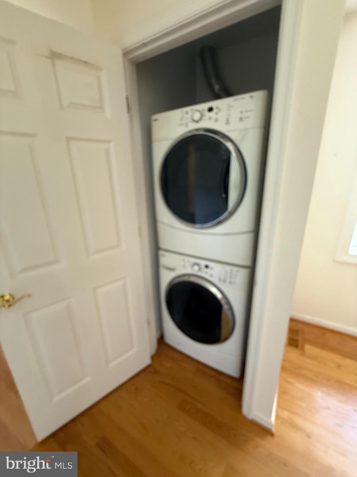 2133 Freda Drive Vienna, VA 22181 - Photo 12 of 35 a view of a storage & utility room with dryer and washer