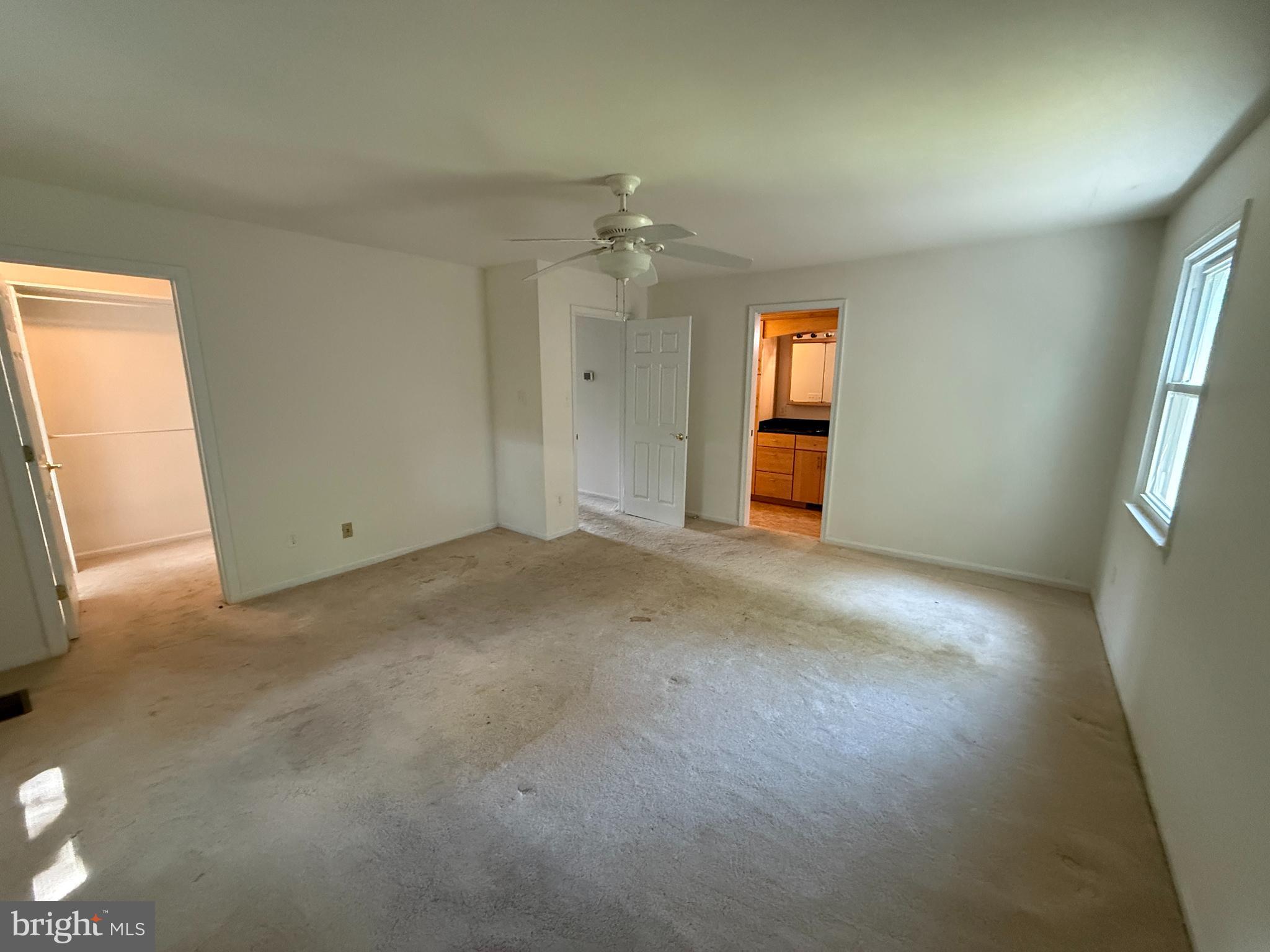 2133 Freda Drive Vienna, VA 22181 - Photo 19 of 35 an empty room with windows and cabinet