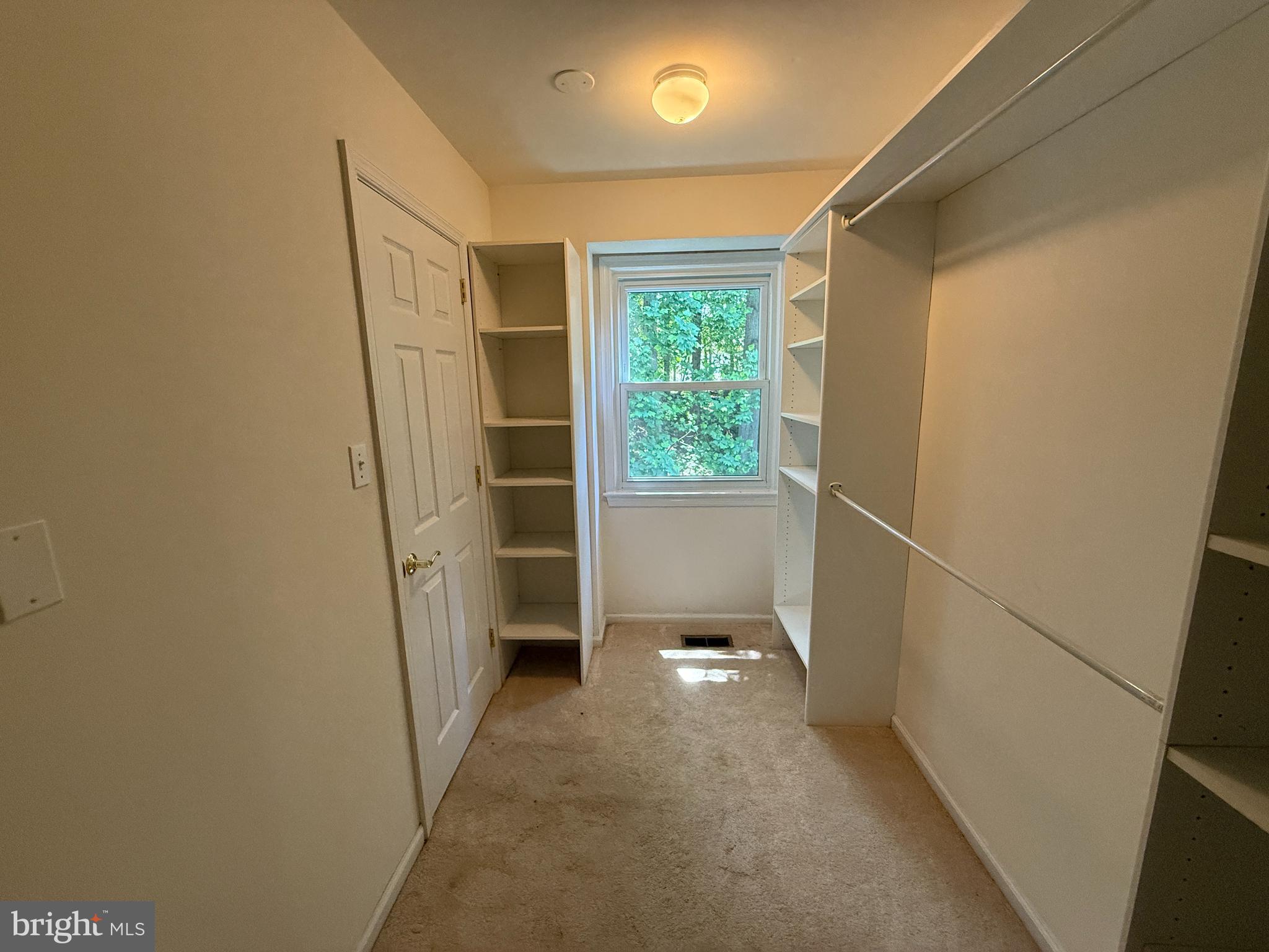 2133 Freda Drive Vienna, VA 22181 - Photo 20 of 35 a view of hallway with stairs and a window