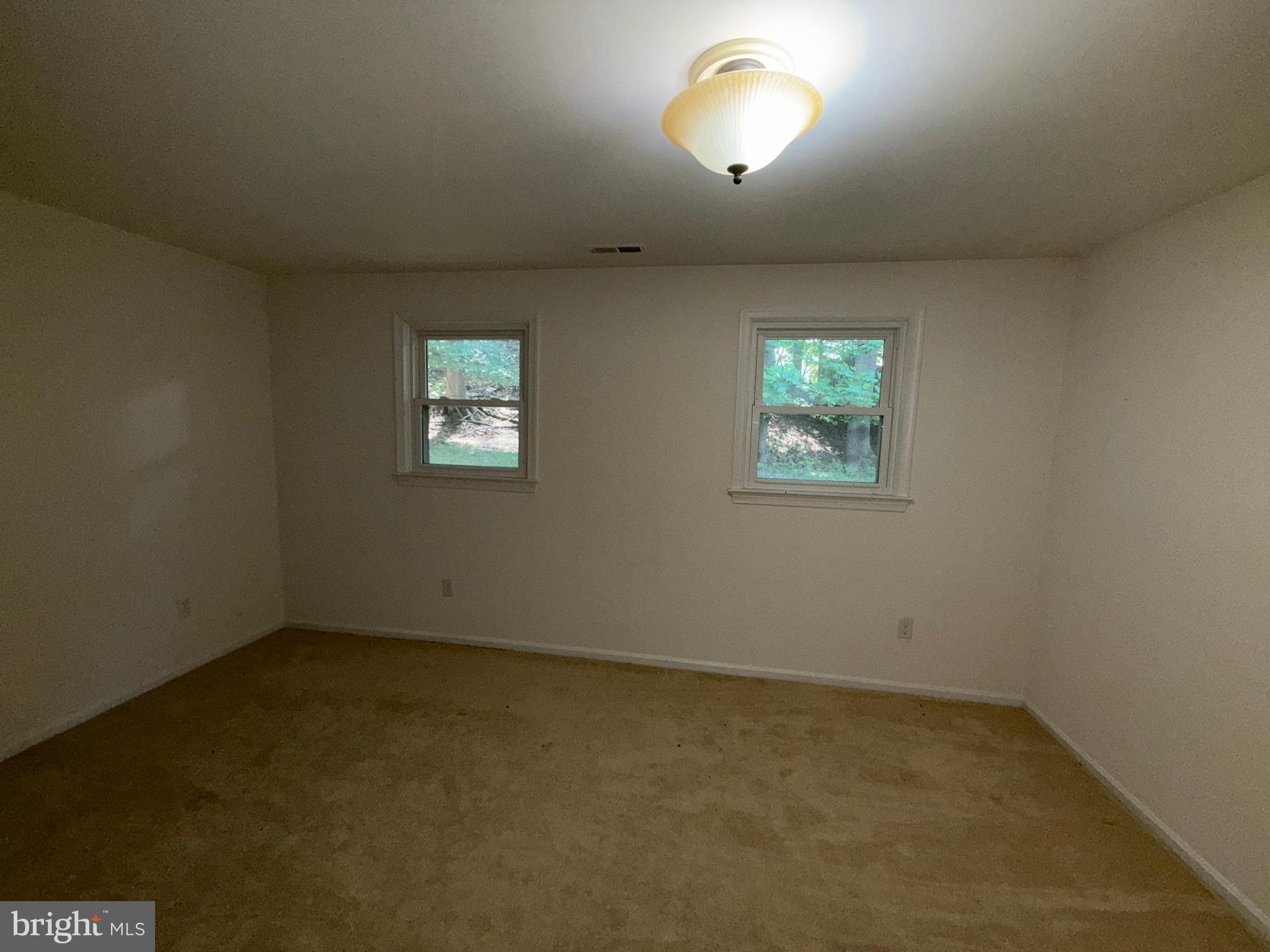 2133 Freda Drive Vienna, VA 22181 - Photo 29 of 35 an empty room with windows