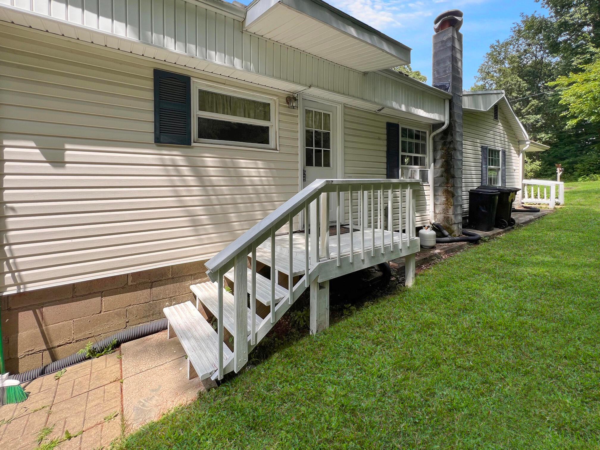 988 Connett Road Nelsonville, OH 45764 - Photo 20 of 28 Just steps out to the full width patio with grill, dining and hot tub