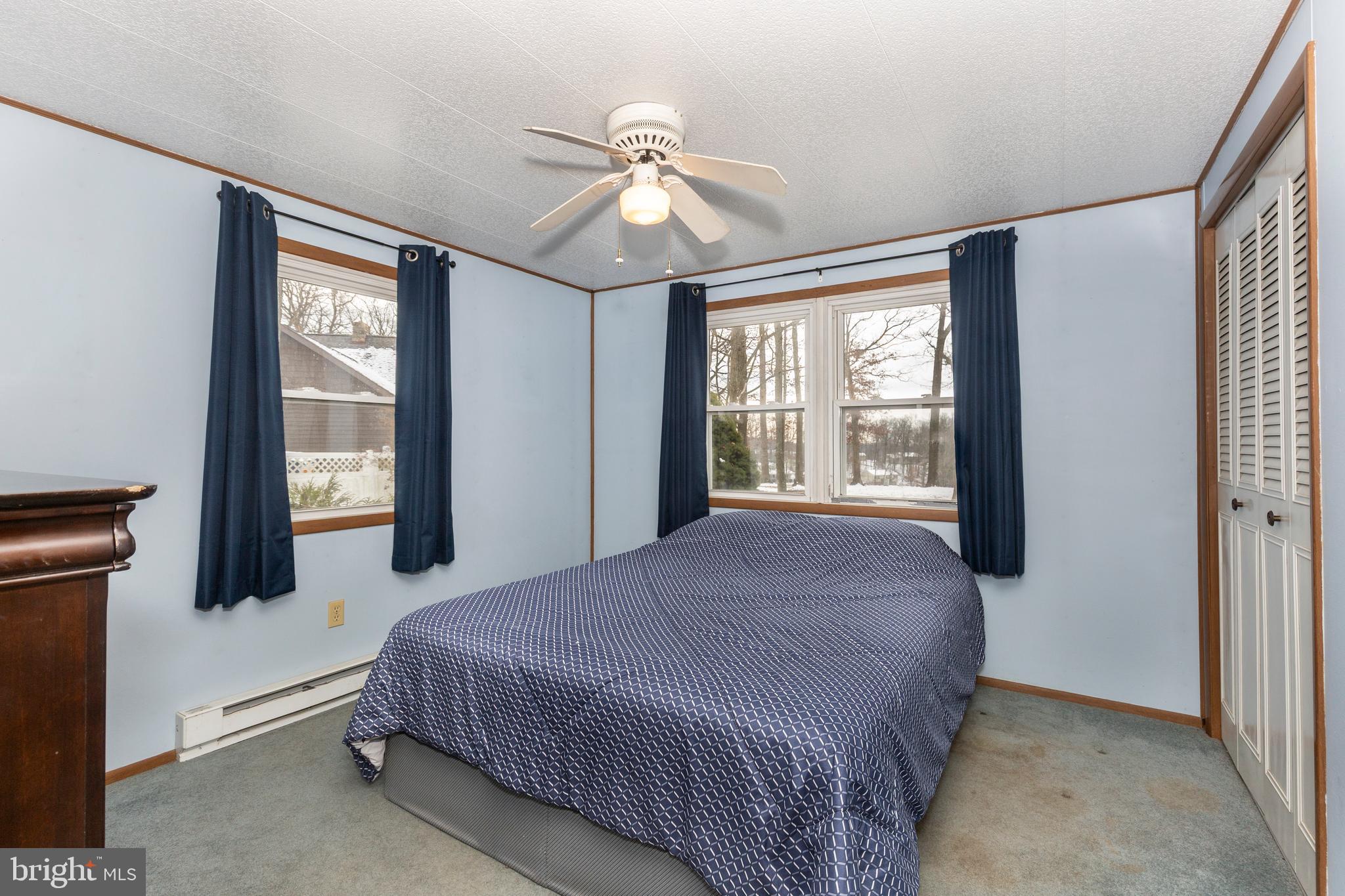 16 Leppo Road Westminster, MD 21158 - Photo 11 of 46 a bedroom with a large bed and a window