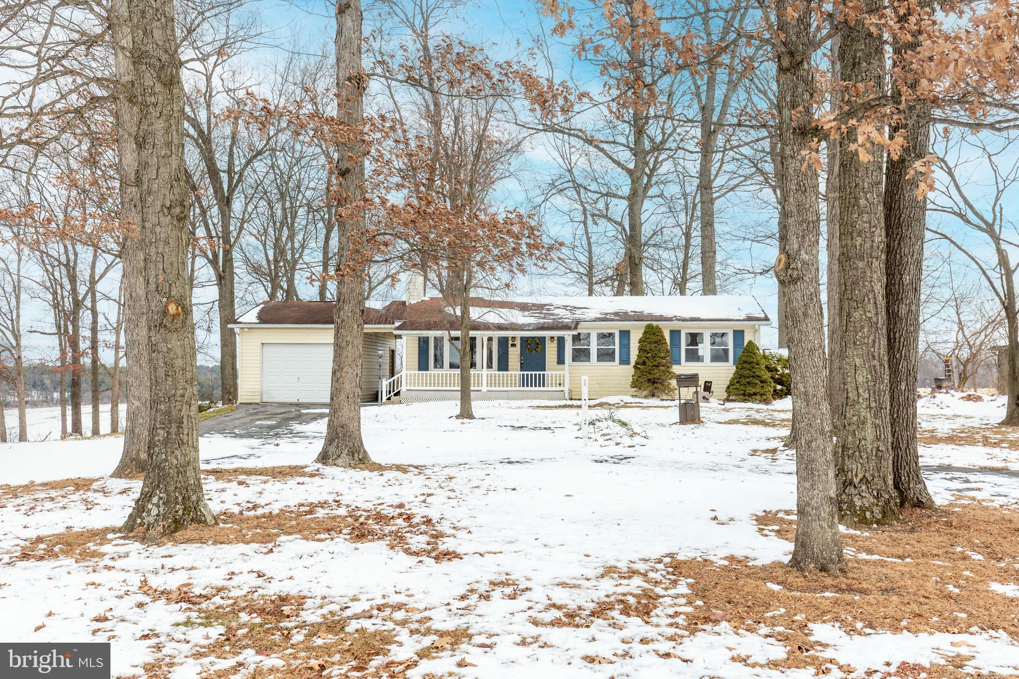 16 Leppo Road Westminster, MD 21158 - Photo 23 of 46 a front view of a house with a yard covered in snow