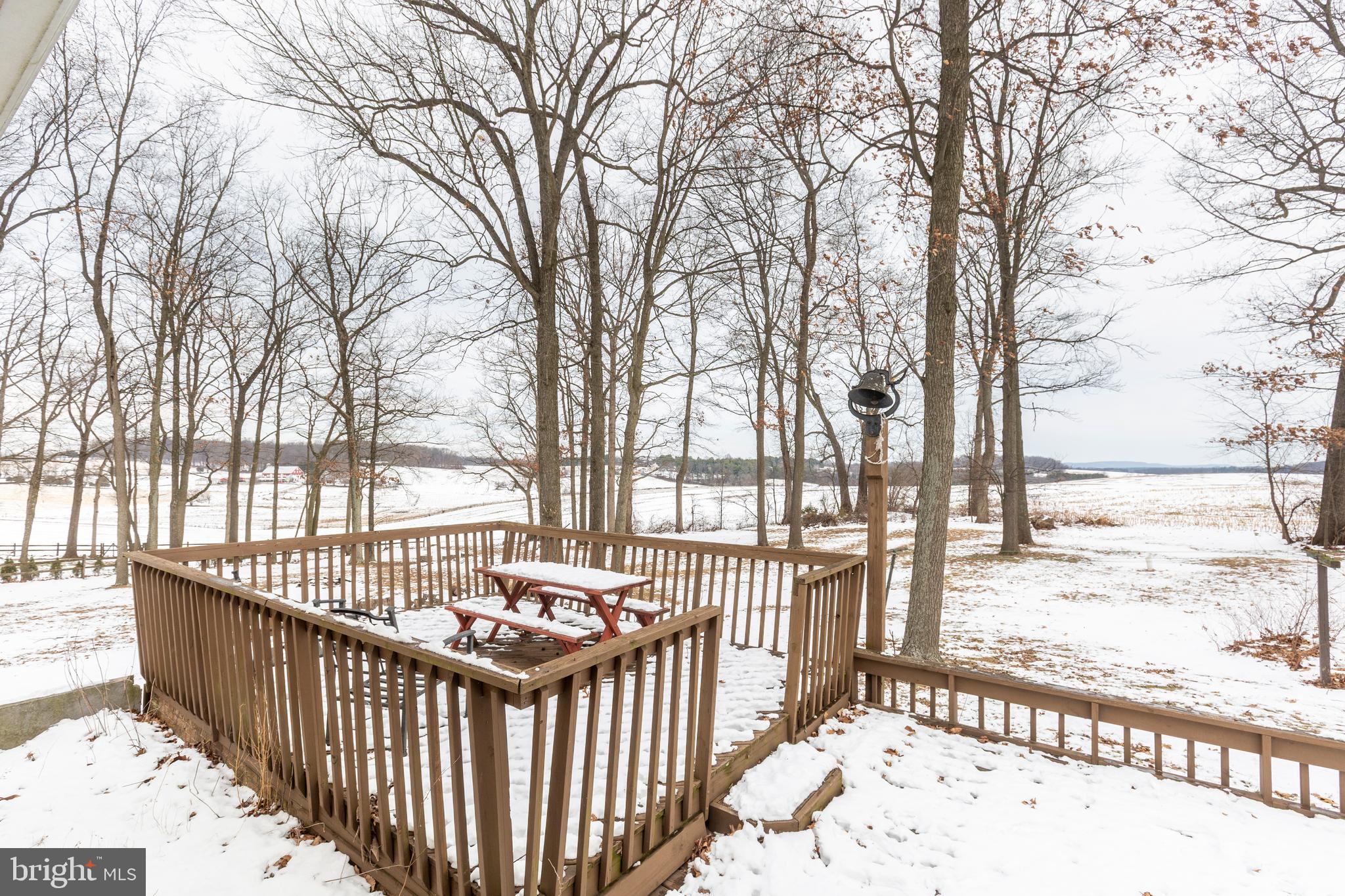 16 Leppo Road Westminster, MD 21158 - Photo 3 of 46 a view of a balcony with wooden fence
