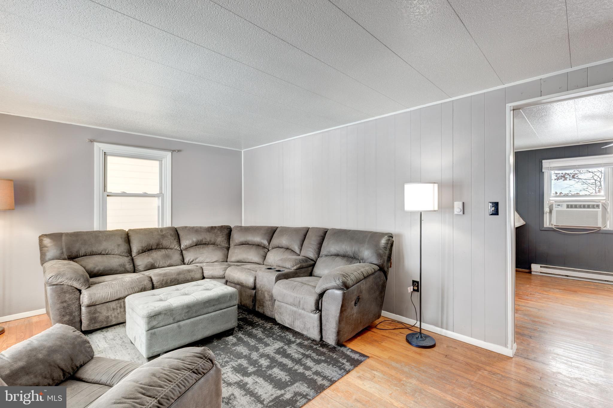 16 Leppo Road Westminster, MD 21158 - Photo 4 of 46 a living room with furniture and a couch