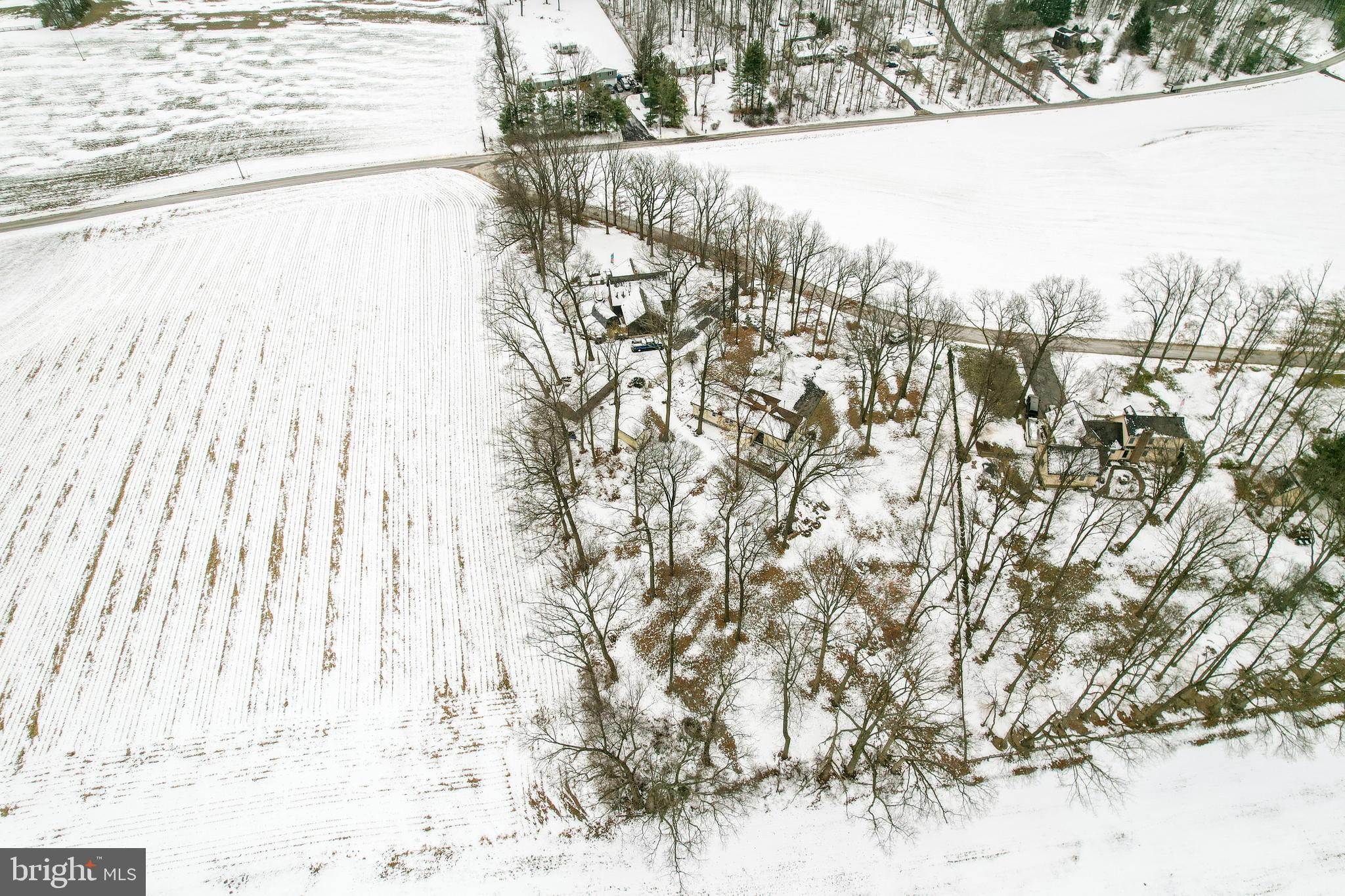 16 Leppo Road Westminster, MD 21158 - Photo 43 of 46 a view of a yard with a snow on the road