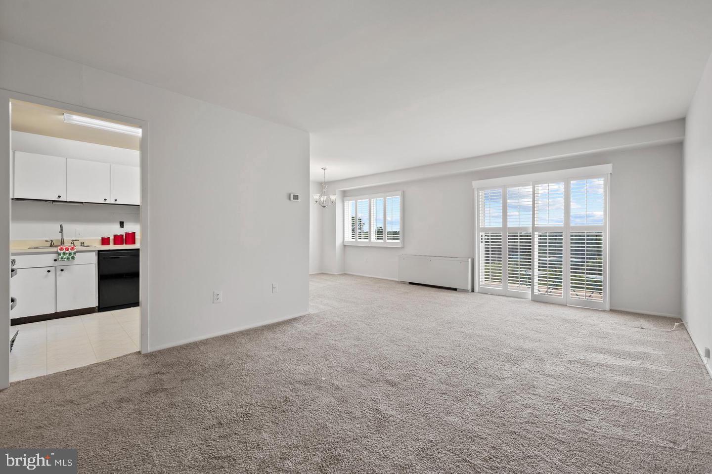 1111 University Boulevard West, Unit 815 Silver Spring, MD 20902 - Photo 6 of 14 a view of an empty room with a window