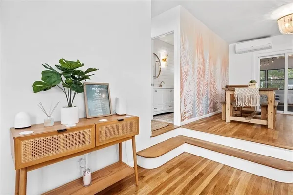 a living room with furniture and a table