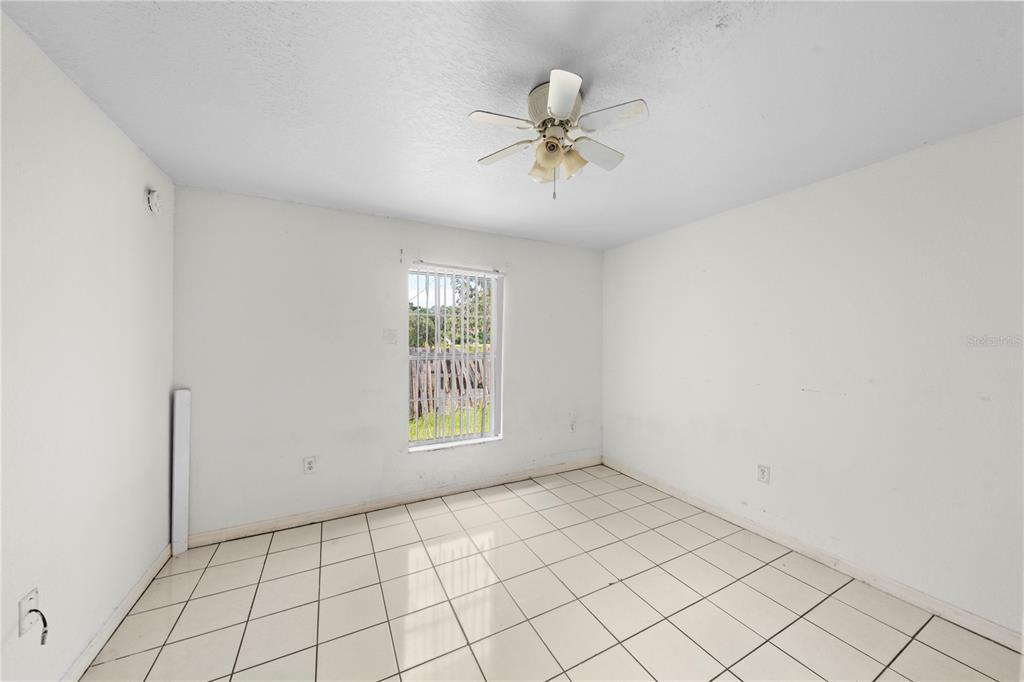 901 Southwest 7th Street Ocala, FL 34471 - Photo 18 of 27 a view of an empty room and window