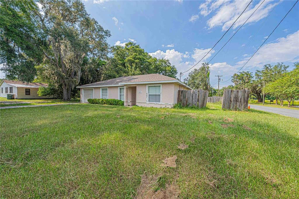 901 Southwest 7th Street Ocala, FL 34471 - Photo 24 of 27 a view of house with backyard