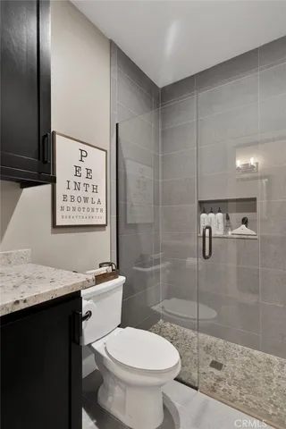 a shelf with books and knick knacks on it