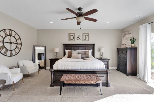 a white bath tub sitting next to a white sink
