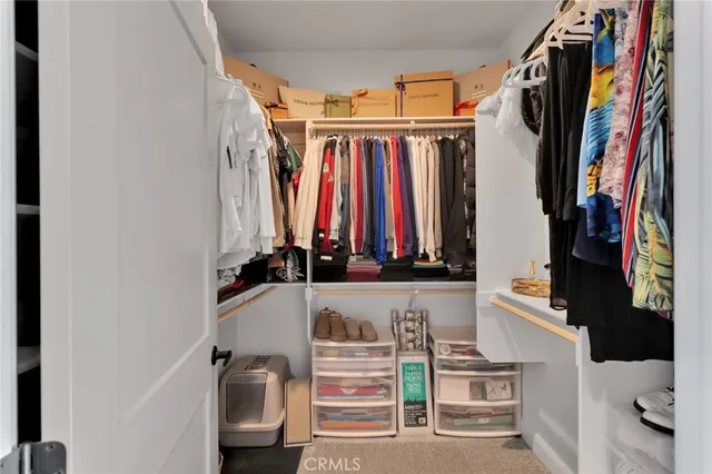 a view of a hallway with seating area