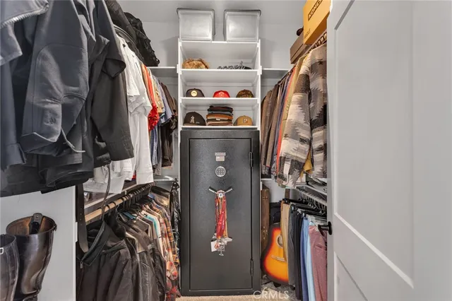 a view of a swimming pool with lounge chairs