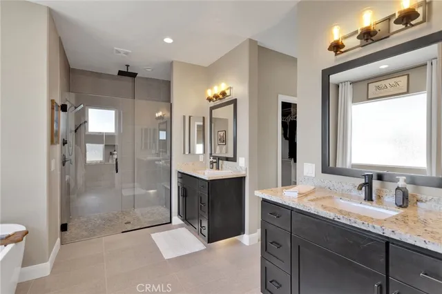 a view of a house with a yard balcony and outdoor seating