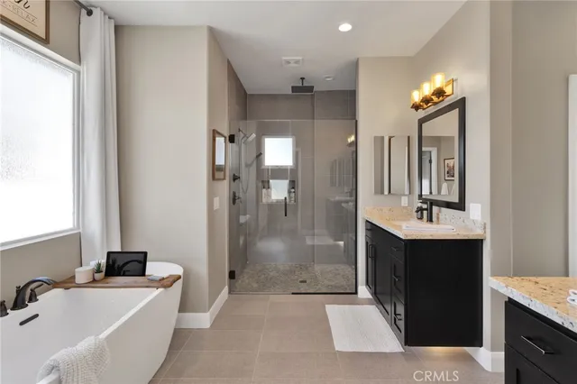 a view of a swimming pool with outdoor seating