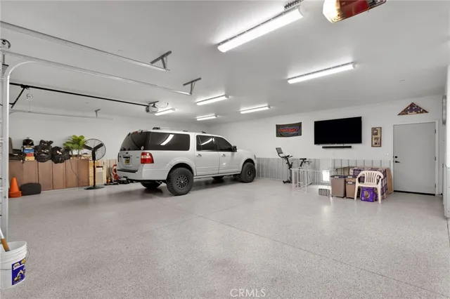 a view of a house with a snow on the road