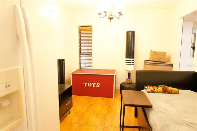 a view of a hall with furniture