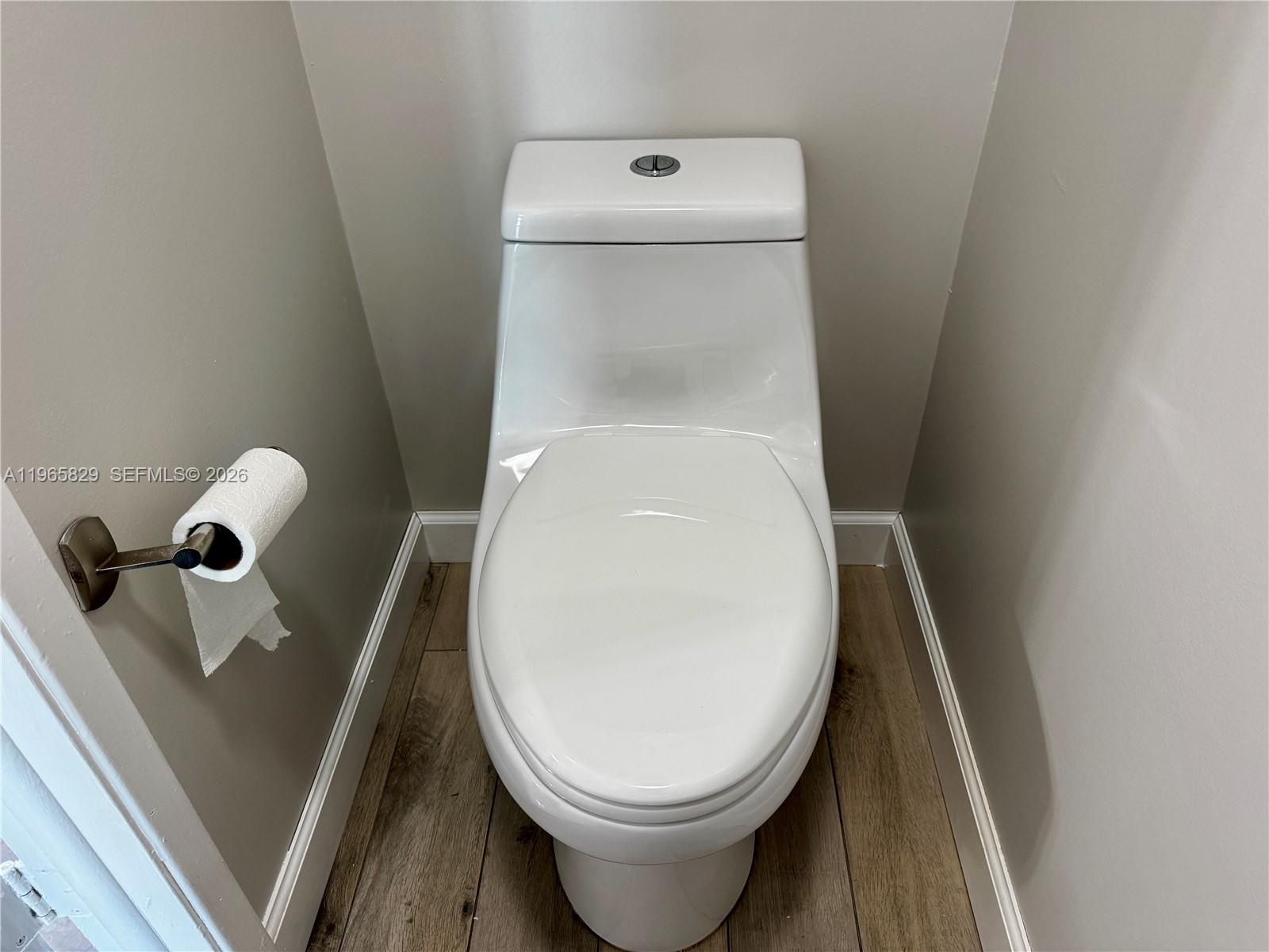 2162 West 60th Street, Unit 14203 Hialeah, FL 33016 - Photo 17 of 23 a close up of a toilet and a sink