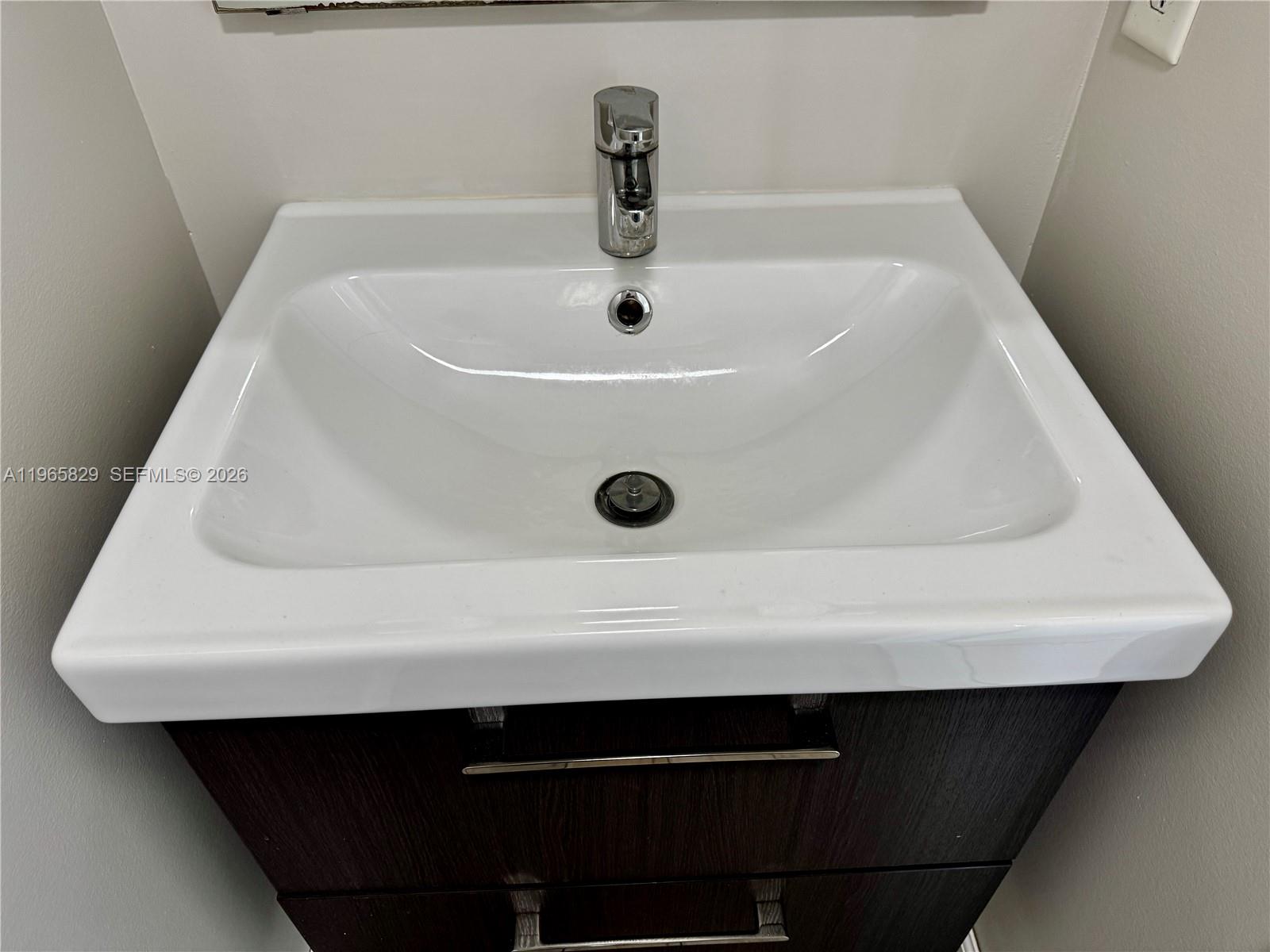 2162 West 60th Street, Unit 14203 Hialeah, FL 33016 - Photo 18 of 23 a close view of a sink