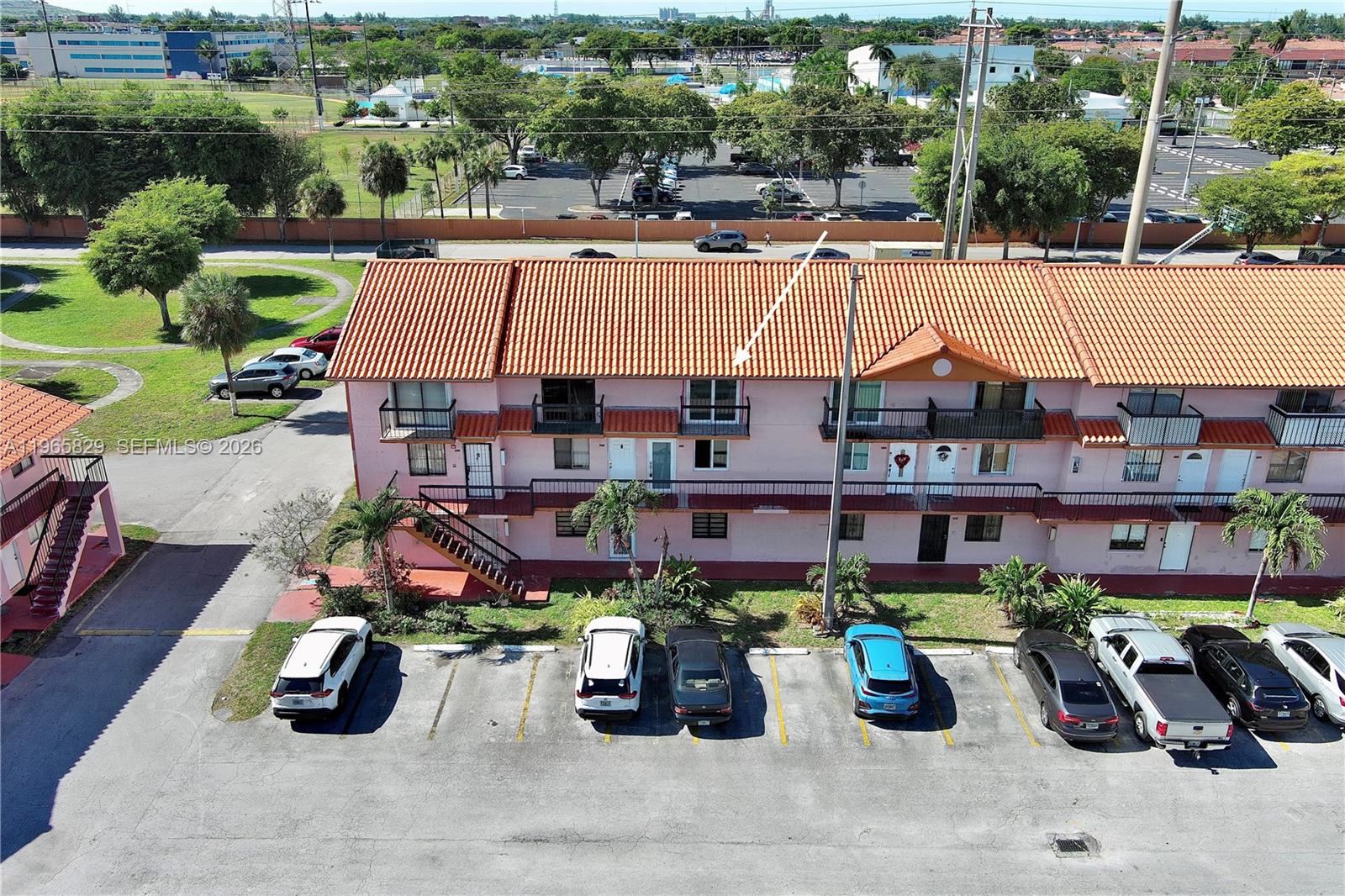 2162 West 60th Street, Unit 14203 Hialeah, FL 33016 - Photo 2 of 23 an aerial view of a houses with yard