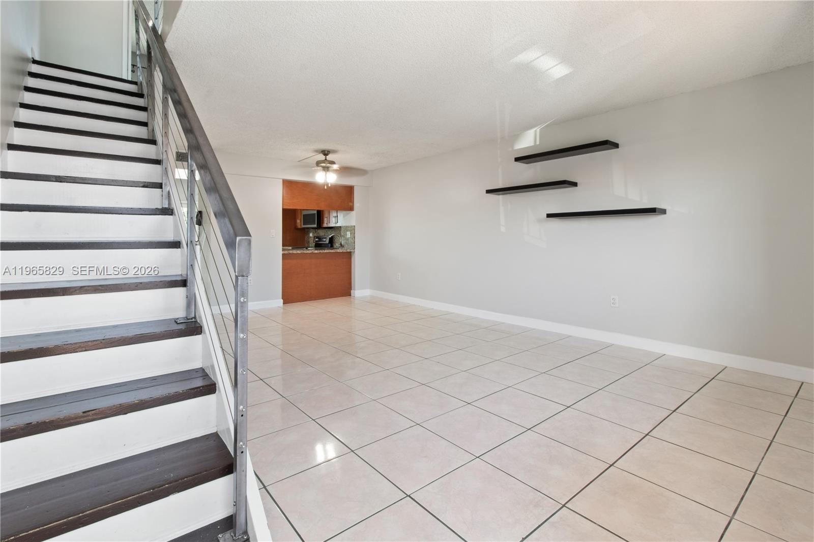 2162 West 60th Street, Unit 14203 Hialeah, FL 33016 - Photo 3 of 23 a view of entryway and hall with wooden floor