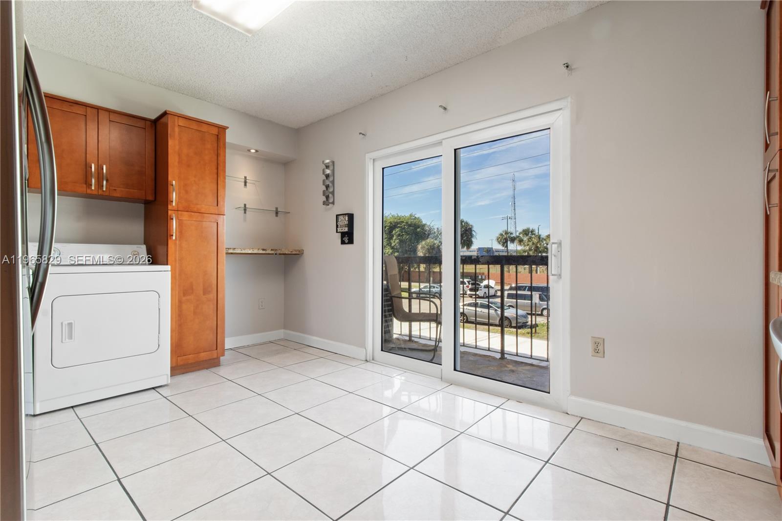 2162 West 60th Street, Unit 14203 Hialeah, FL 33016 - Photo 9 of 23 a view of kitchen with furniture wooden floor and window