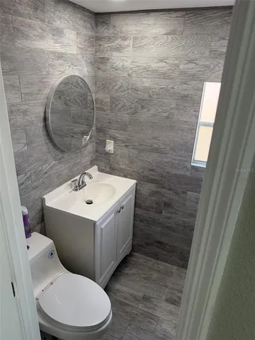 a bathroom with a sink and a shower