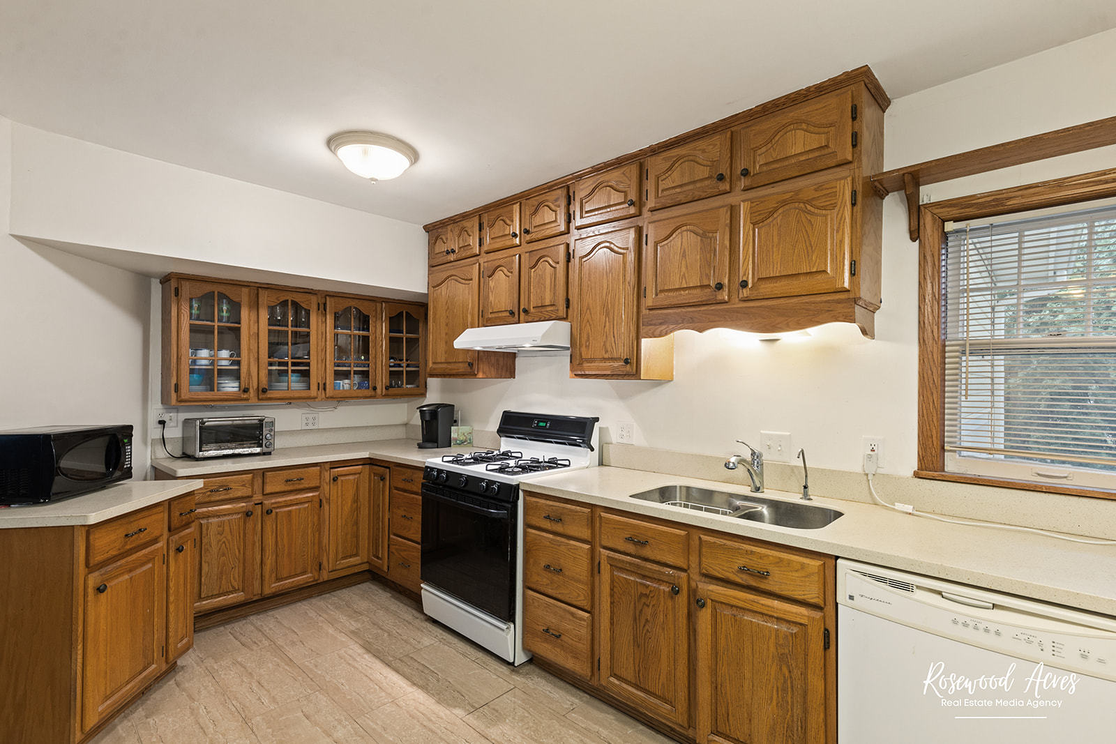 2657 River Road Kankakee, IL 60901 - Photo 19 of 22 a kitchen with stainless steel appliances granite countertop a sink a stove and cabinets