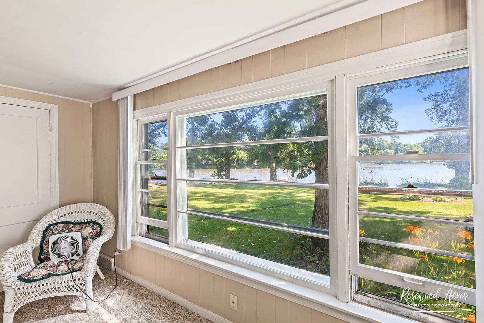 2657 River Road Kankakee, IL 60901 - Photo 3 of 22 a view of a chair and fire pit in front of a window
