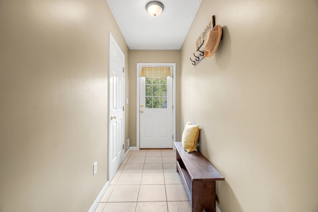 10 Sullivan Way Canton, MA 02021 - Photo 20 of 42 a view of hallway with window and a bathroom