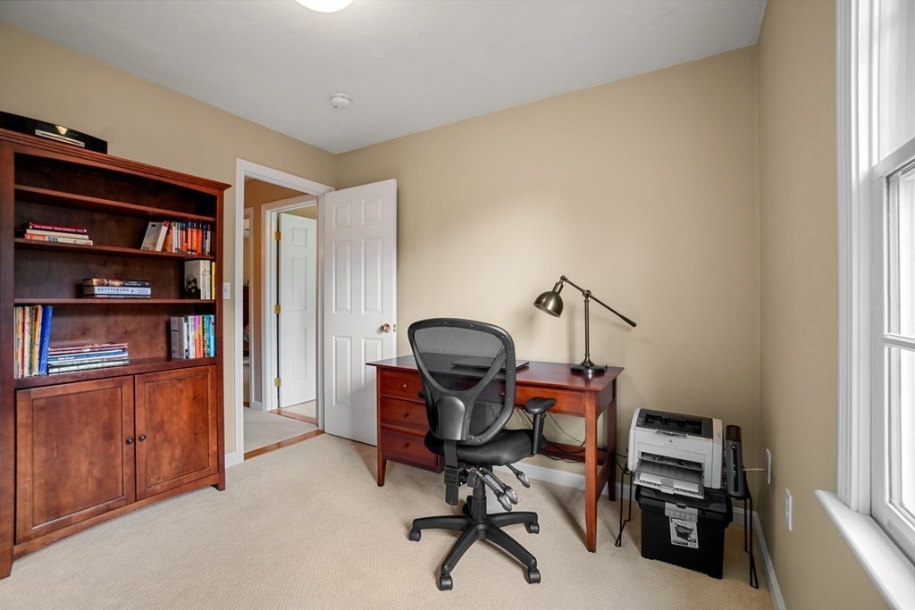 10 Sullivan Way Canton, MA 02021 - Photo 29 of 42 a view of a workspace with furniture and a window