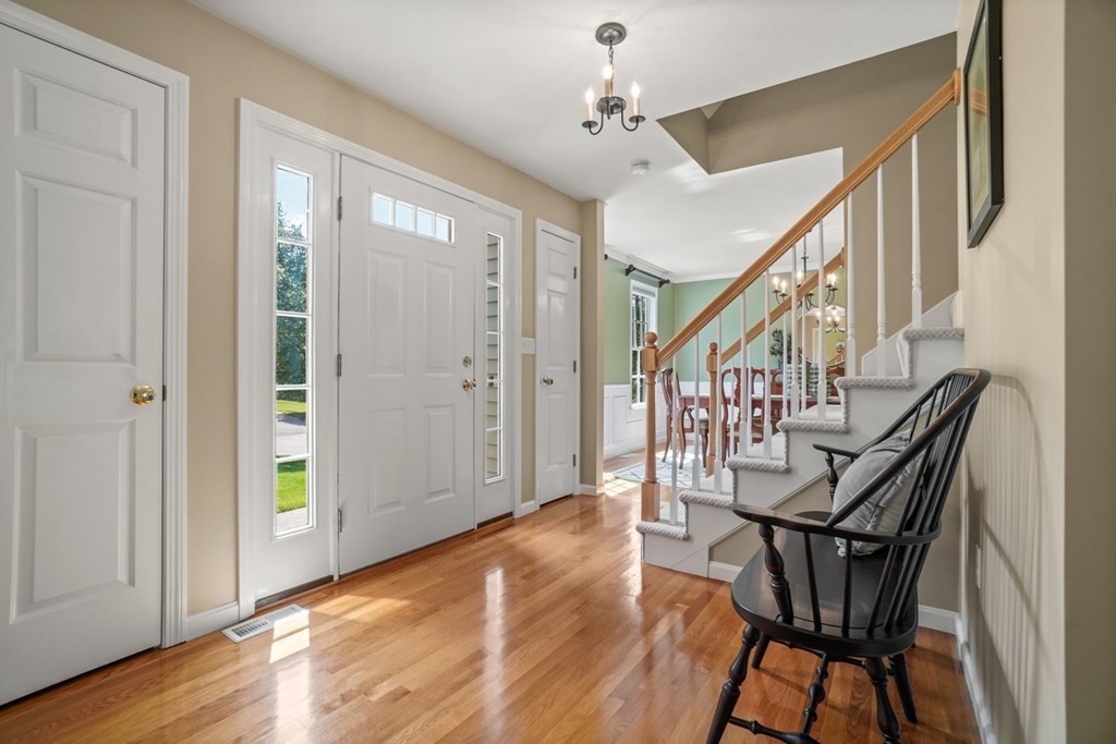10 Sullivan Way Canton, MA 02021 - Photo 3 of 42 a view of an entryway and dining room