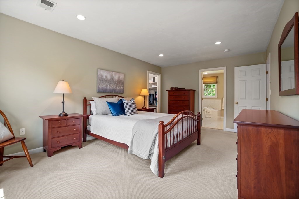 10 Sullivan Way Canton, MA 02021 - Photo 33 of 42 a bed room with furniture and a couch