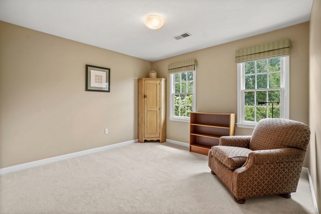 10 Sullivan Way Canton, MA 02021 - Photo 35 of 42 a living room with furniture and a large window