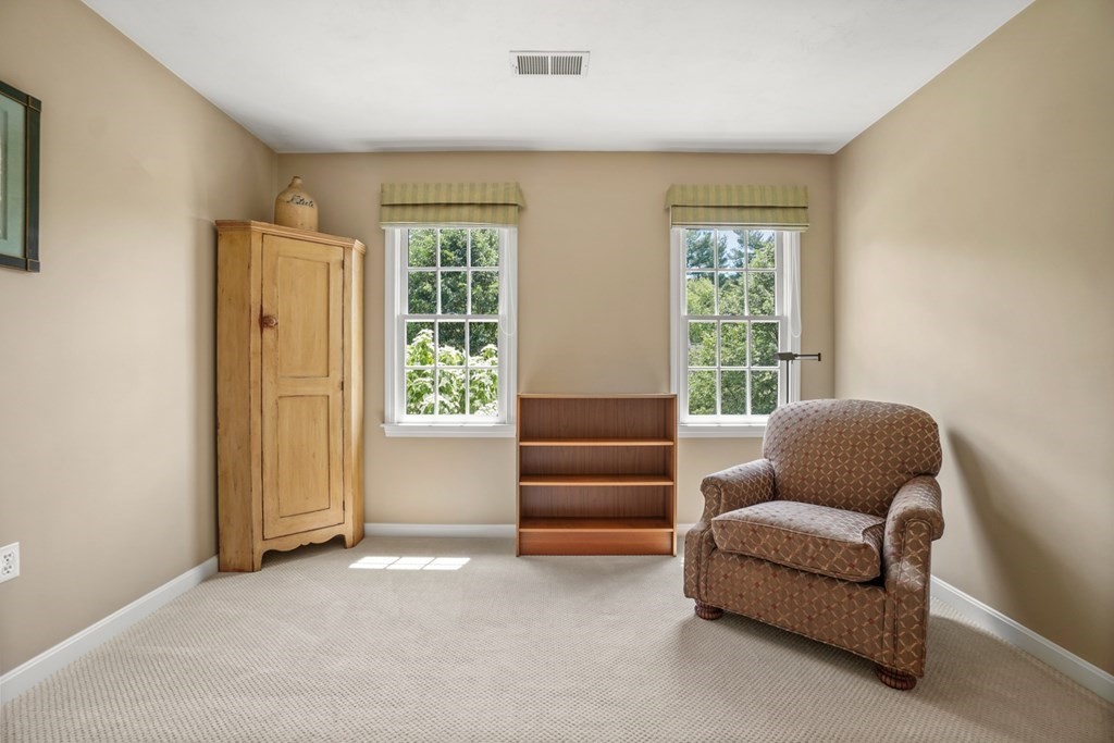 10 Sullivan Way Canton, MA 02021 - Photo 36 of 42 a living room with furniture and a window