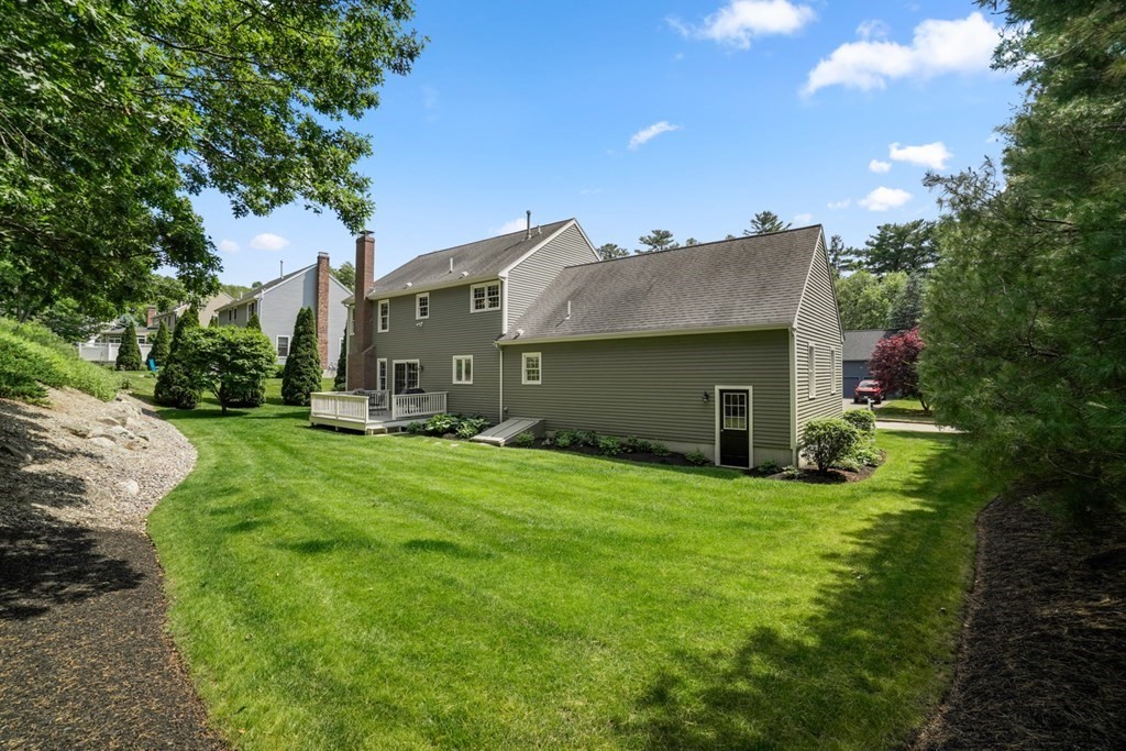 10 Sullivan Way Canton, MA 02021 - Photo 41 of 42 a view of a house with a yard