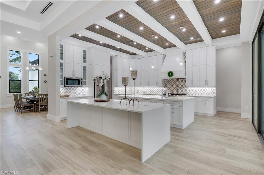 530 1st Street Northwest Naples, FL 34120 - Photo 11 of 35 a large room with lots of counter space and a sink