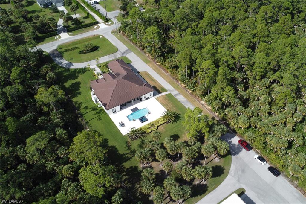 530 1st Street Northwest Naples, FL 34120 - Photo 4 of 35 an aerial view of house with yard