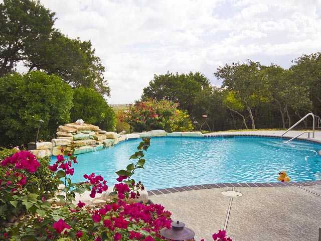 1322 Pasa Tiempo Road Leander, TX 78641 - Photo 1 of 1 a view of a pathway with a yard